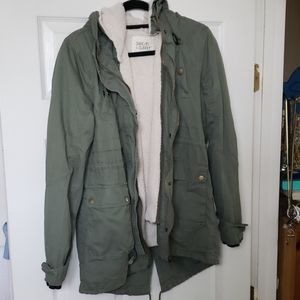 Used green utility jacket with dual layer